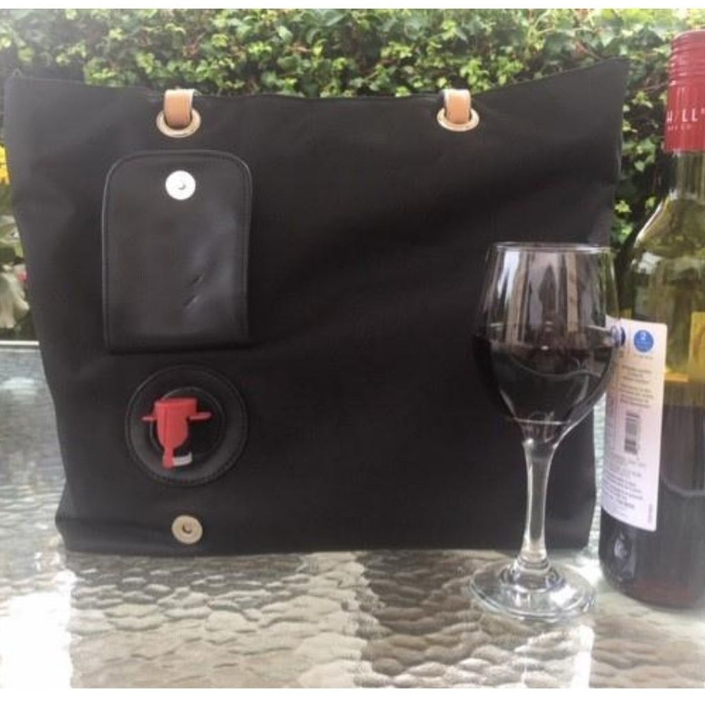 Connect wine purse in black. Wine Purse with a hidden insulated pocket & pouring spout that holds 2 bottles of wine. Includes a removable wine pouch for ease of use.